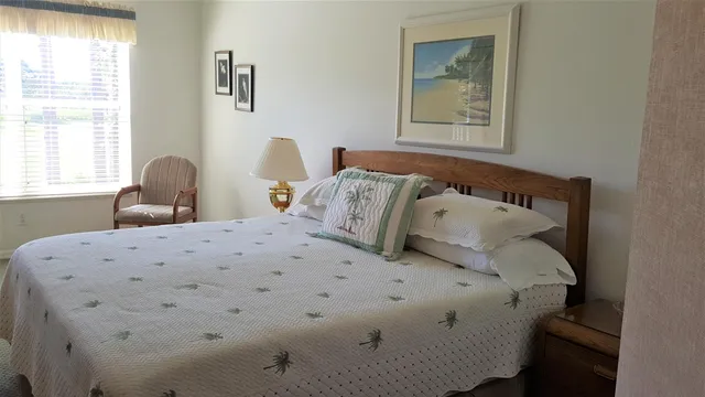 a bath tub sitting in a bathroom next to a window