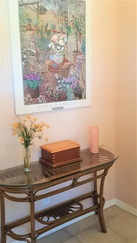 a view of a workspace with furniture