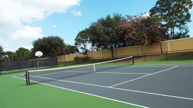 a lake view with houses in back