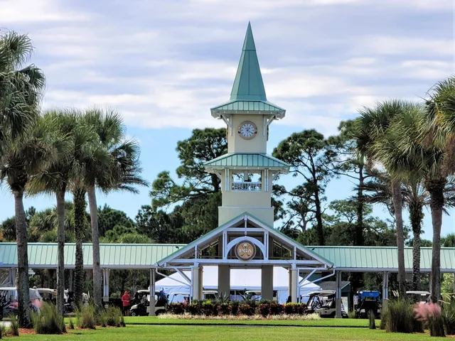 a view of a swimming pool with an outdoor seating