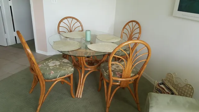 a kitchen with a white cabinets sink and refrigerator