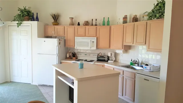 a bathroom with a sink and a window
