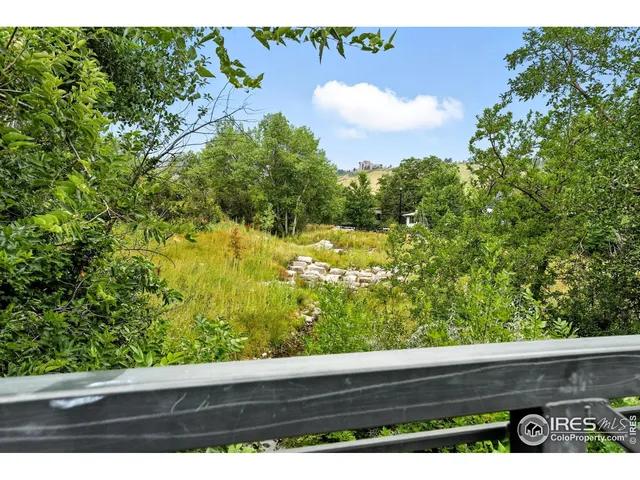 a view of a bench in a garden
