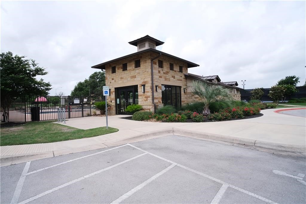 14110 McCoy Loop Austin, TX 78717 - Photo 2 of 35 a white house with a yard and plants