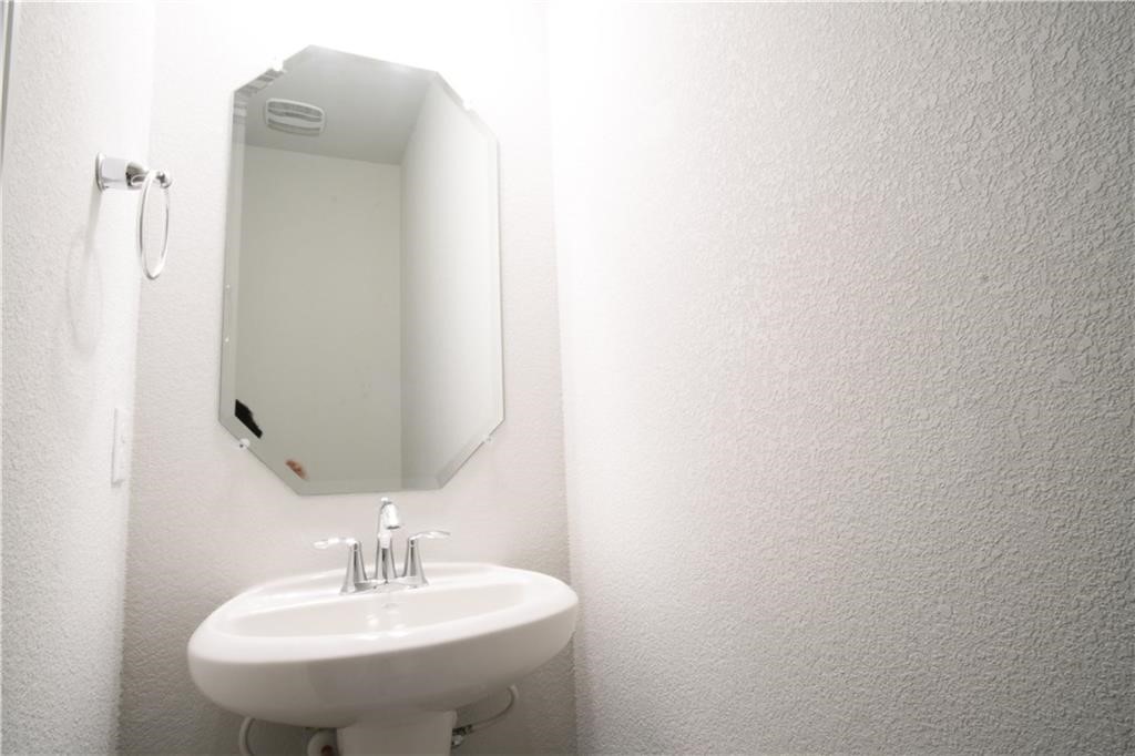 14110 McCoy Loop Austin, TX 78717 - Photo 20 of 35 a bathroom with a sink and a mirror