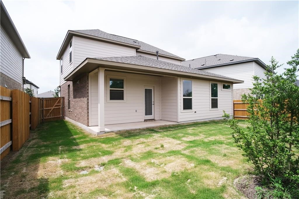 14110 McCoy Loop Austin, TX 78717 - Photo 28 of 35 a view of a house with backyard