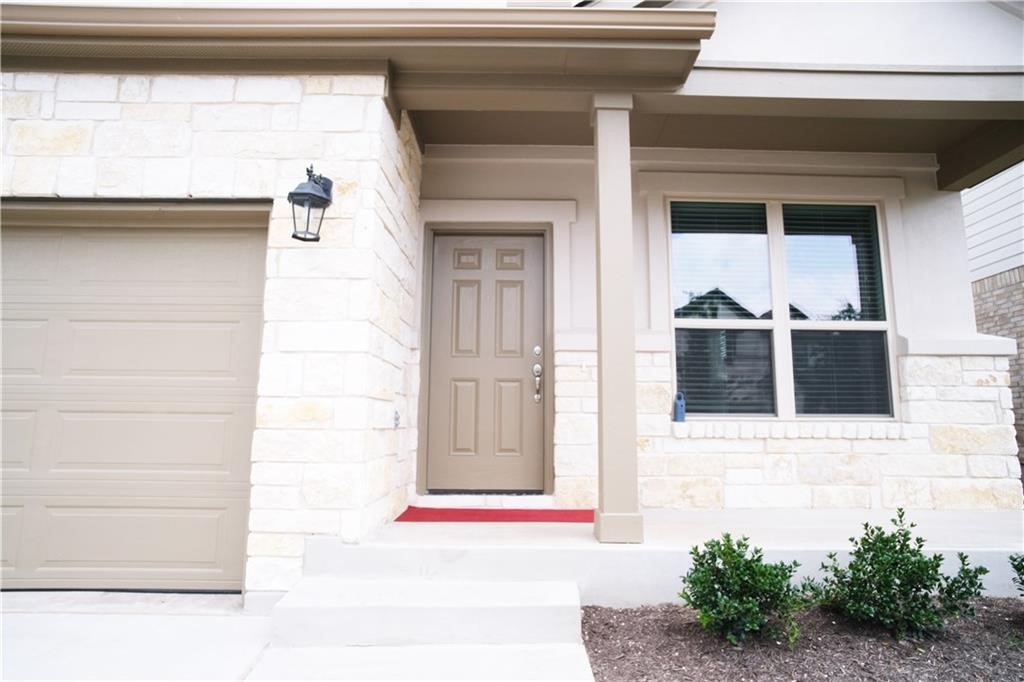 14110 McCoy Loop Austin, TX 78717 - Photo 29 of 35 a view of a door of the house