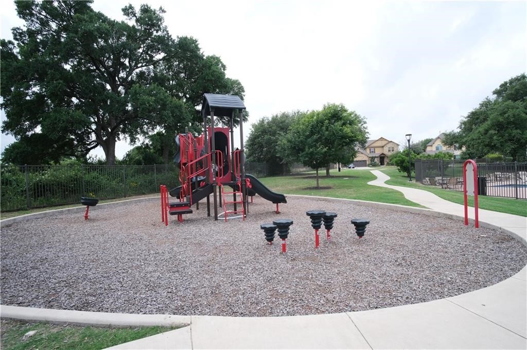 14110 McCoy Loop Austin, TX 78717 - Photo 32 of 35 a view of a park with slide