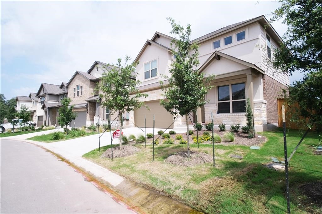 14110 McCoy Loop Austin, TX 78717 - Photo 33 of 35 a view of a house with backyard and sitting area