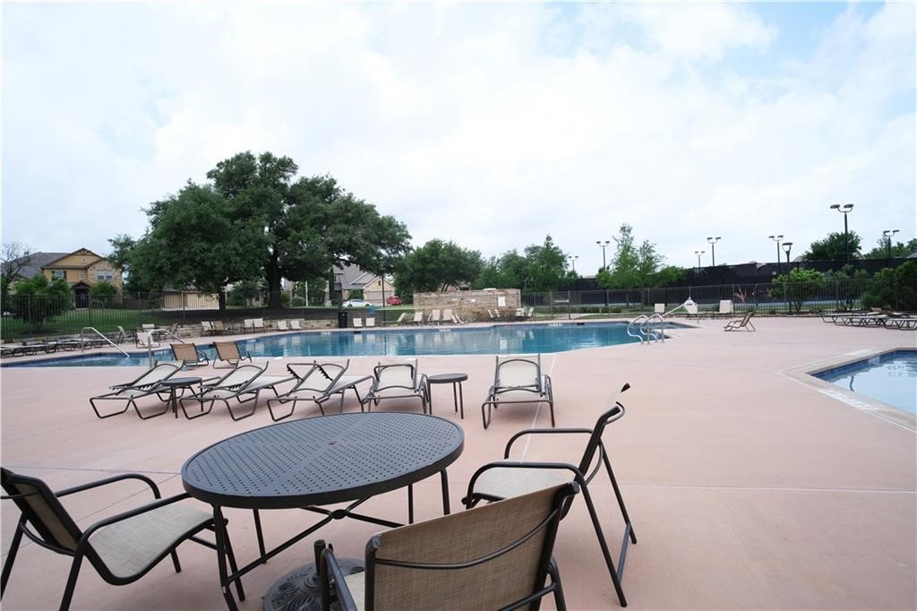 14110 McCoy Loop Austin, TX 78717 - Photo 7 of 35 a view of a chairs and table in patio