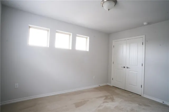 a view of a chairs and table in patio