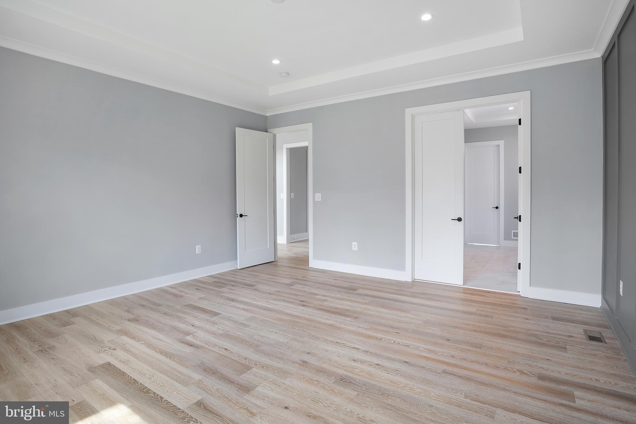 7019 Statendam Court McLean, VA 22101 - Photo 14 of 52 a view of an empty room with wooden floor