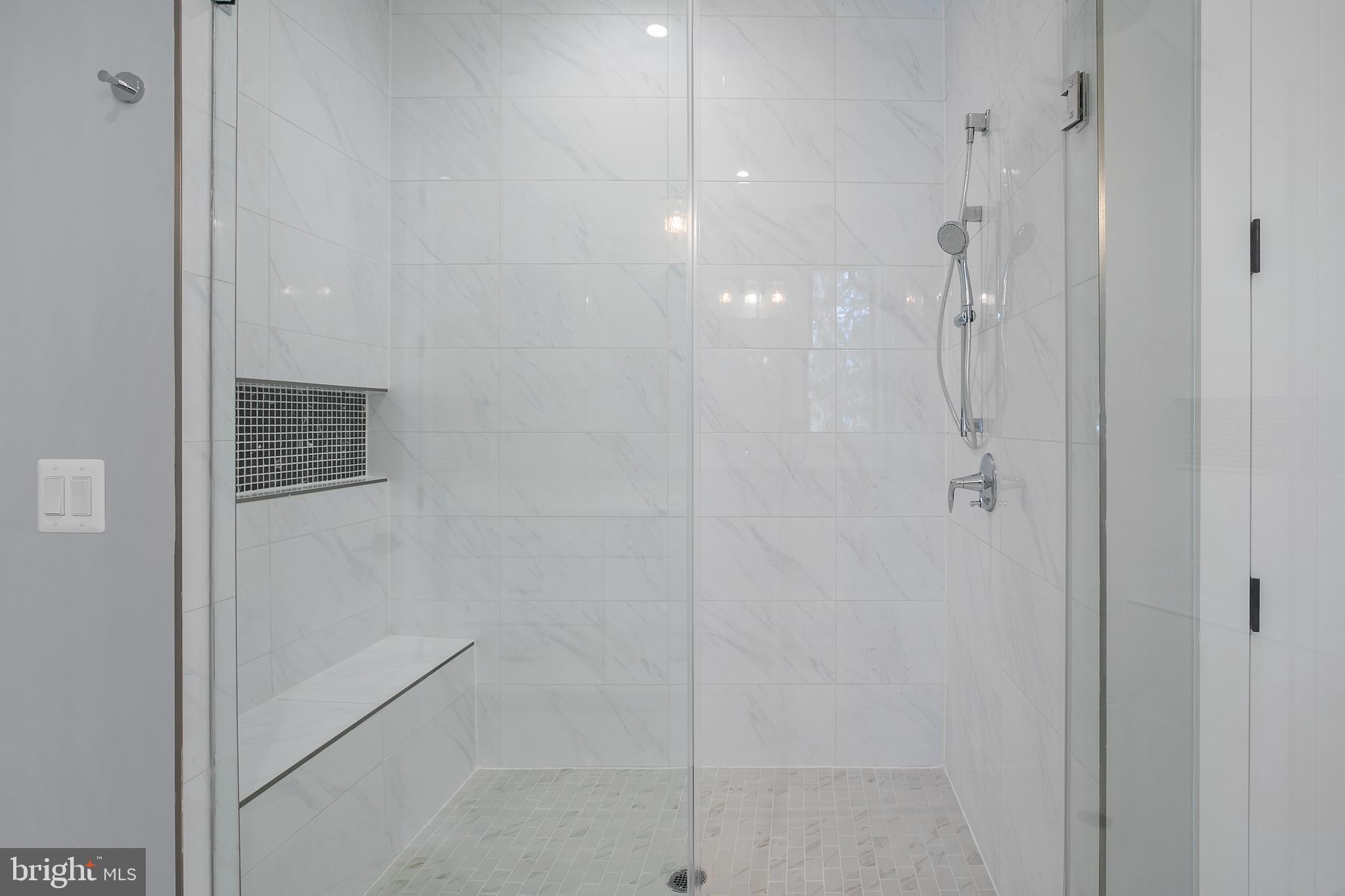 7019 Statendam Court McLean, VA 22101 - Photo 15 of 52 a bathroom with a shower