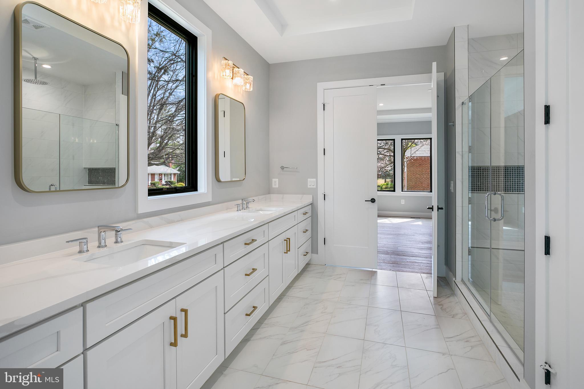 7019 Statendam Court McLean, VA 22101 - Photo 16 of 52 a spacious bathroom with a double vanity sink mirror and double