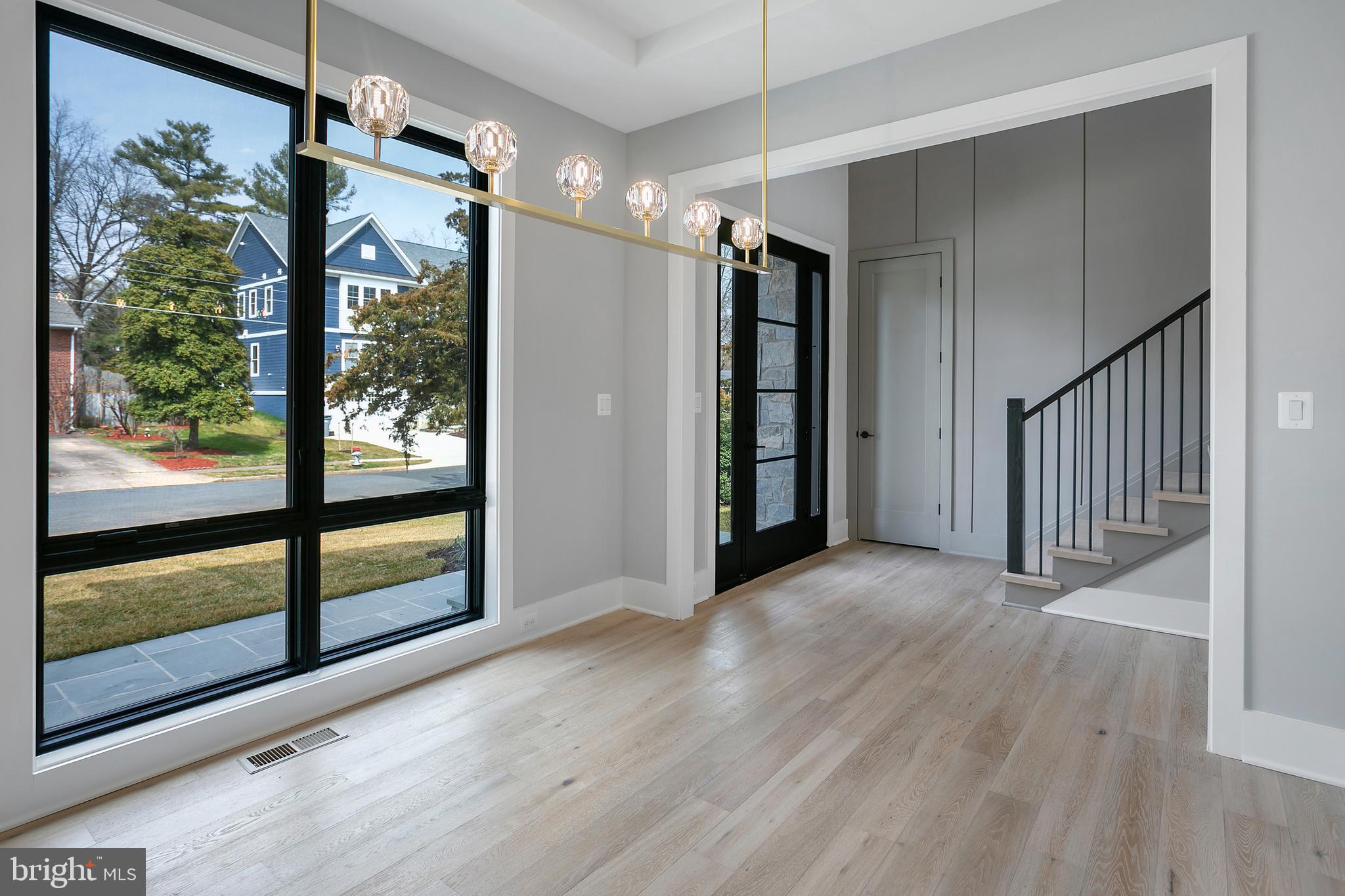 7019 Statendam Court McLean, VA 22101 - Photo 20 of 52 a view of a hallway with wooden floor and door
