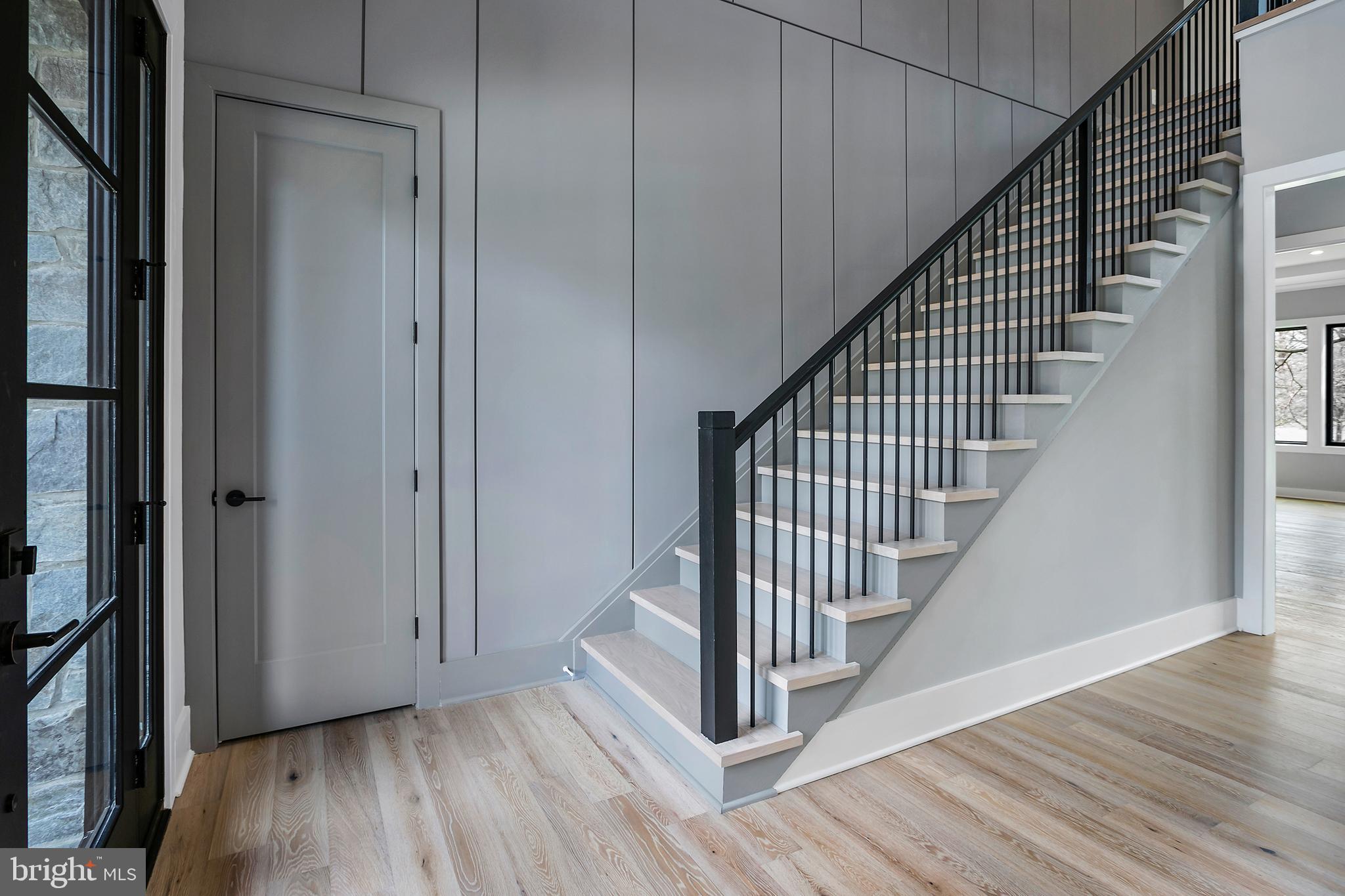 7019 Statendam Court McLean, VA 22101 - Photo 21 of 52 a view of a hallway with wooden floor and entryway
