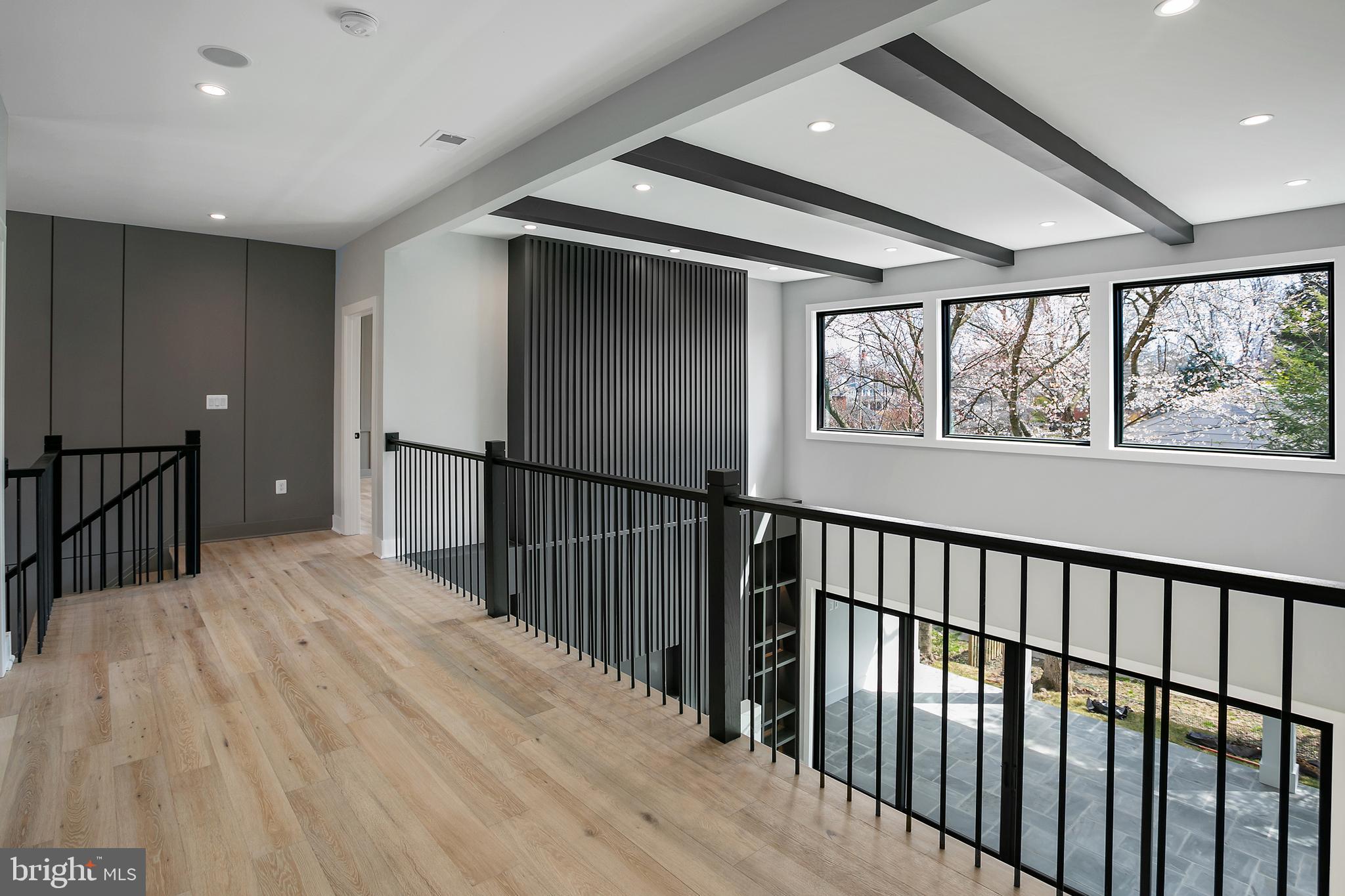 7019 Statendam Court McLean, VA 22101 - Photo 33 of 52 a view of staircase with lots of wooden floor and windows