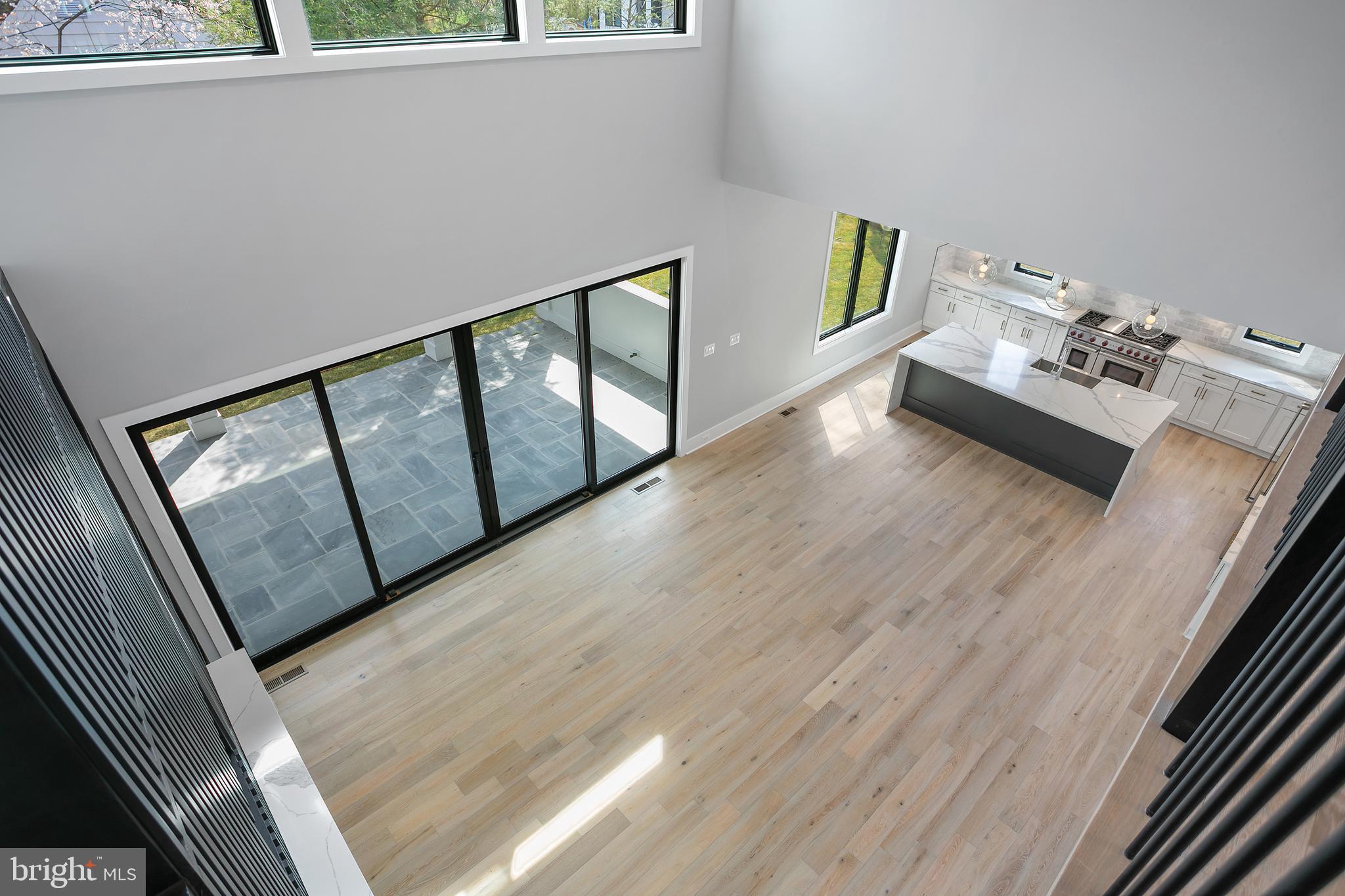 7019 Statendam Court McLean, VA 22101 - Photo 34 of 52 a view of a livingroom with wooden floor and stairs