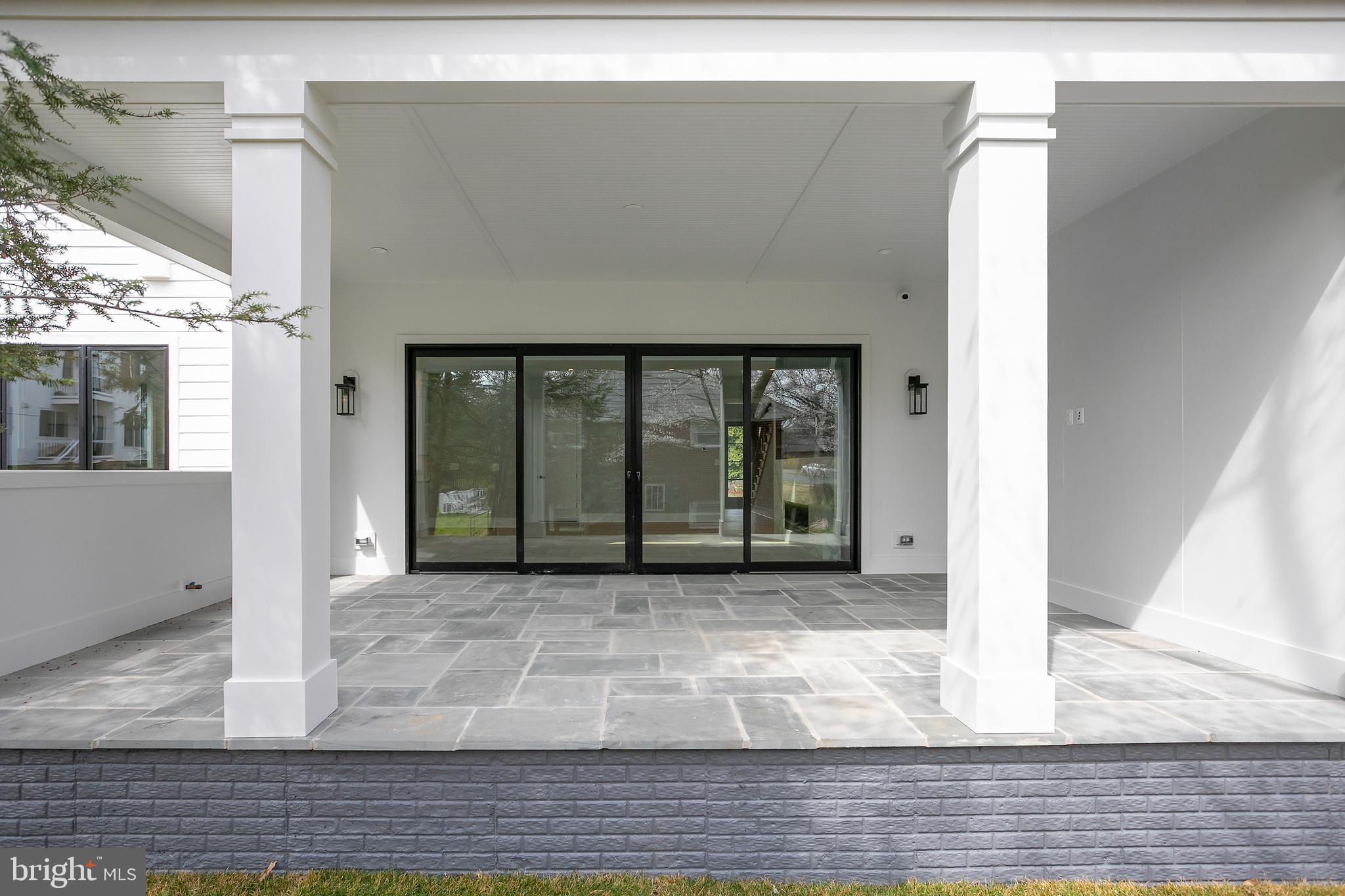 7019 Statendam Court McLean, VA 22101 - Photo 50 of 52 a view of a room with wooden floor and a large window