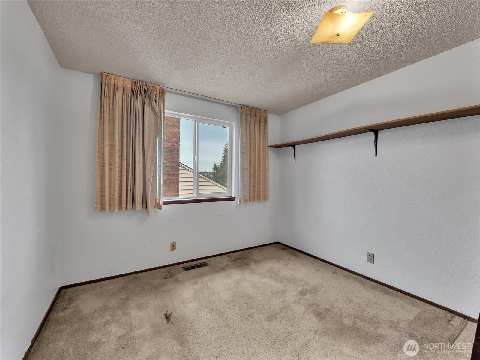 2523 23rd Avenue South Seattle, WA 98144 - Photo 15 of 29 an empty room with windows