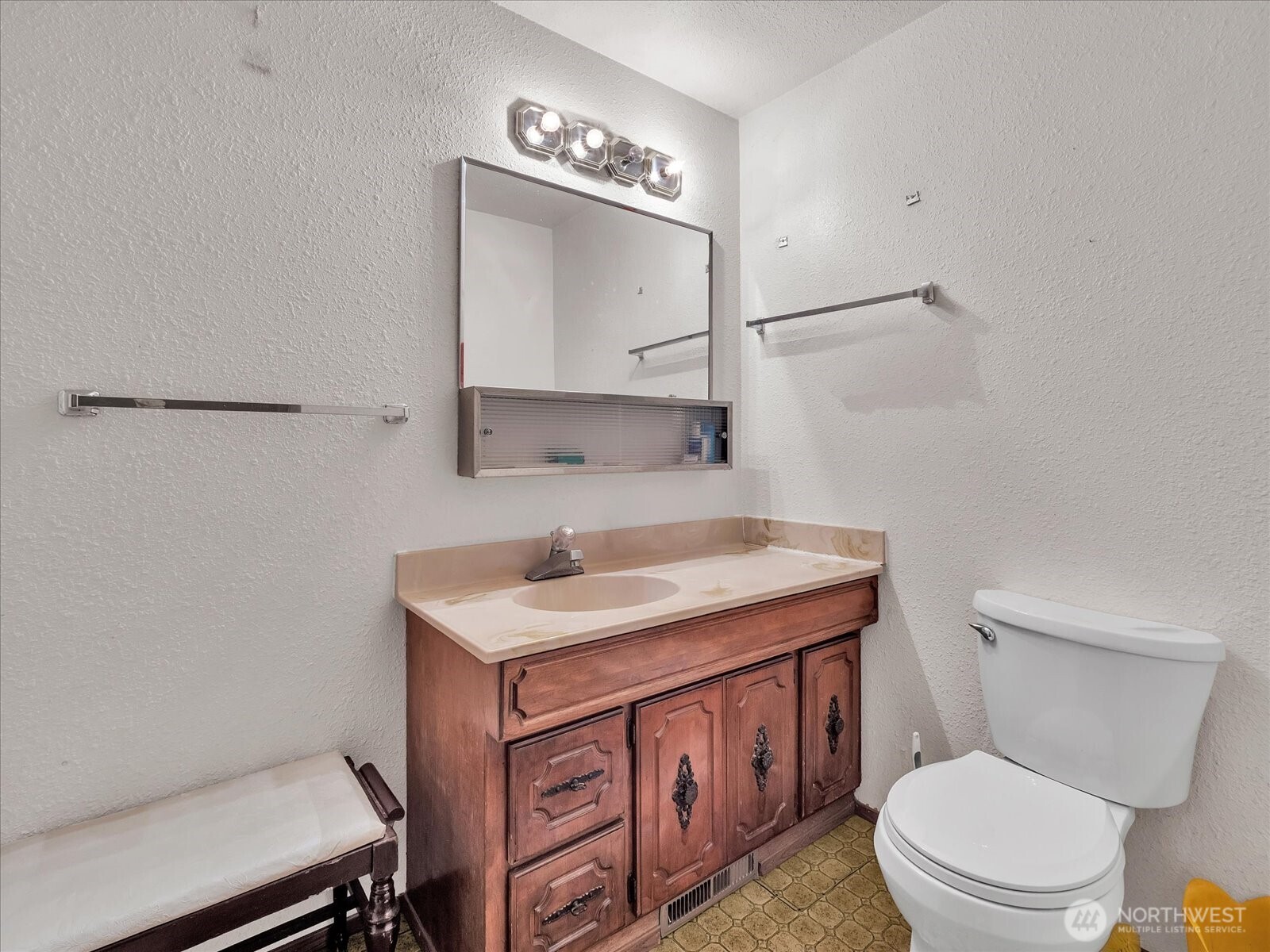 2523 23rd Avenue South Seattle, WA 98144 - Photo 16 of 29 a bathroom with a toilet a sink and mirror
