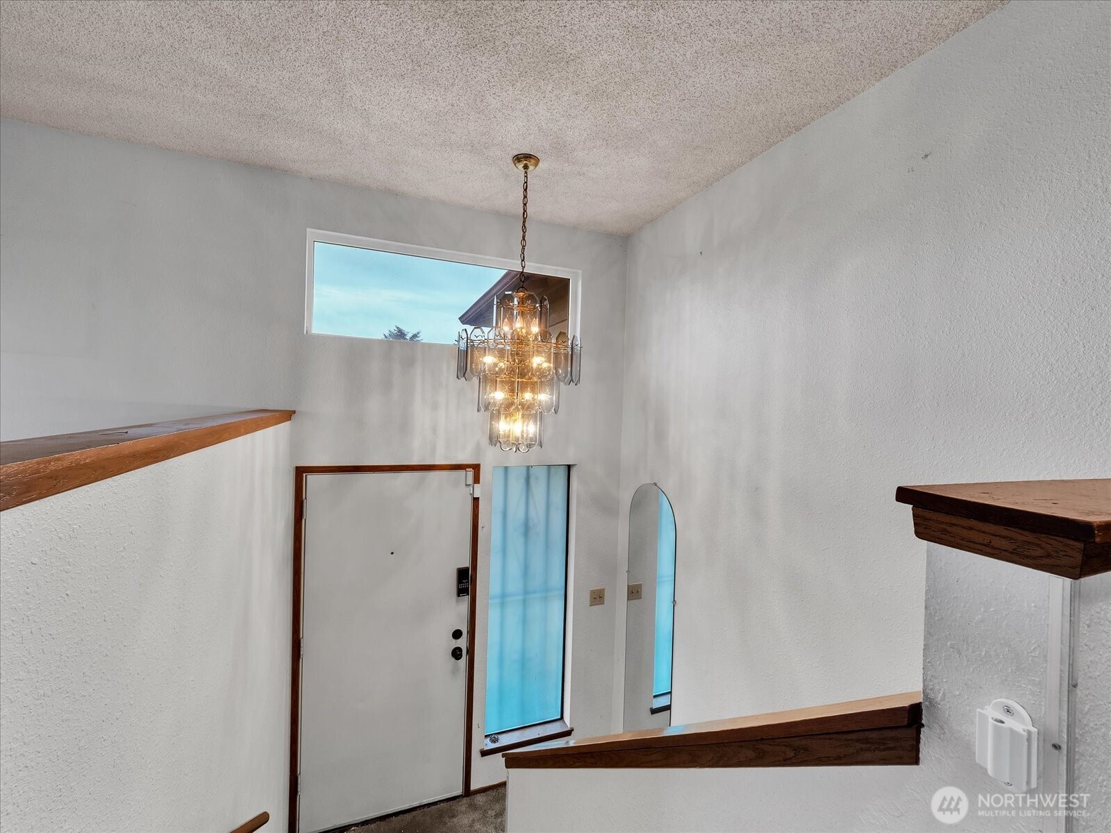 2523 23rd Avenue South Seattle, WA 98144 - Photo 17 of 29 a very nice looking room with a large mirror and a wooden floor