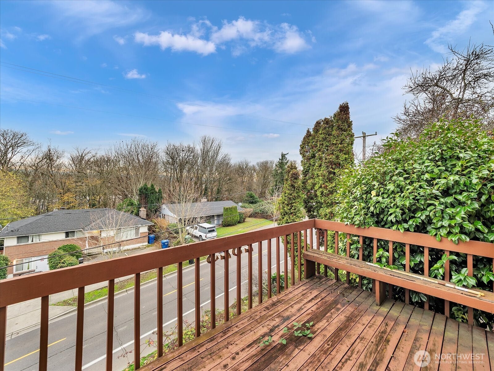 2523 23rd Avenue South Seattle, WA 98144 - Photo 24 of 29 a balcony with wooden floor and fence