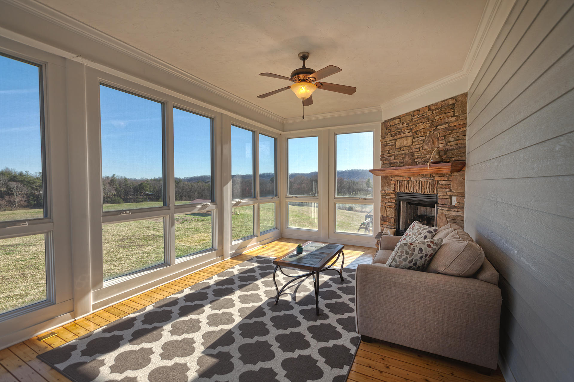 5030 Bethlehem Road Boones Mill, VA 24065 - Photo 22 of 43 a living room with furniture and a large window
