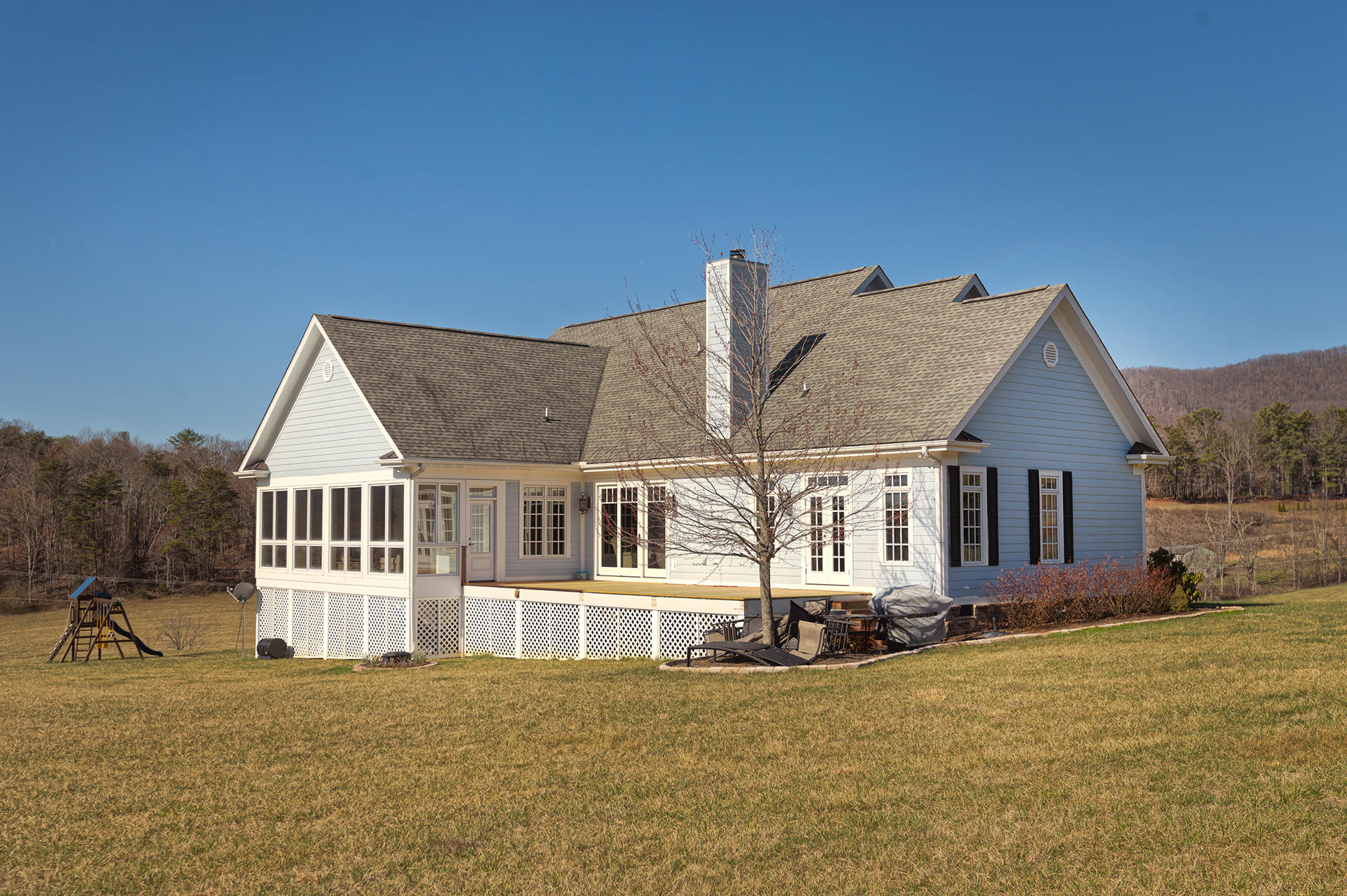 5030 Bethlehem Road Boones Mill, VA 24065 - Photo 34 of 43 front view of a house with a yard