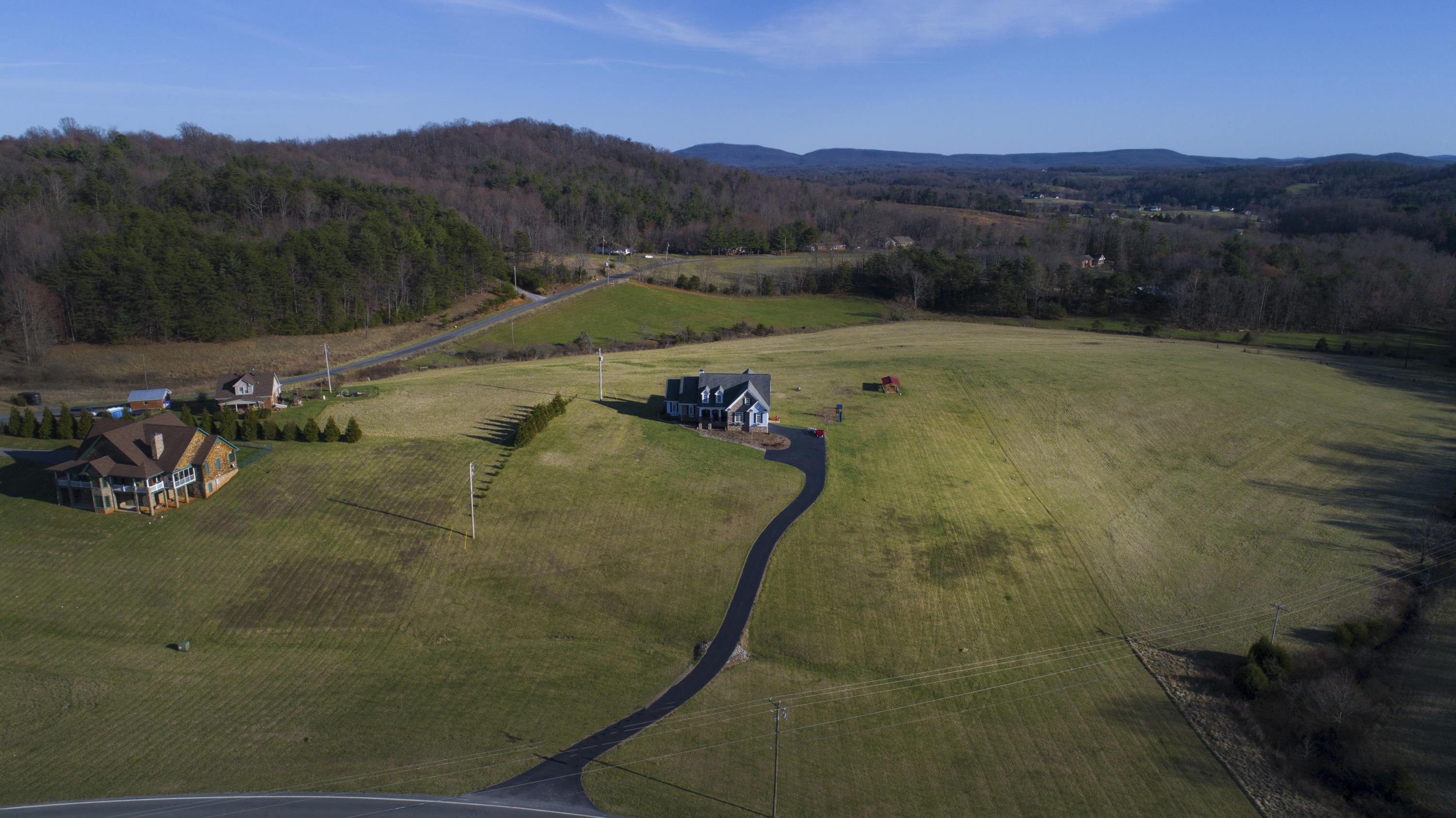 5030 Bethlehem Road Boones Mill, VA 24065 - Photo 37 of 43 a view of a lake in middle of the town