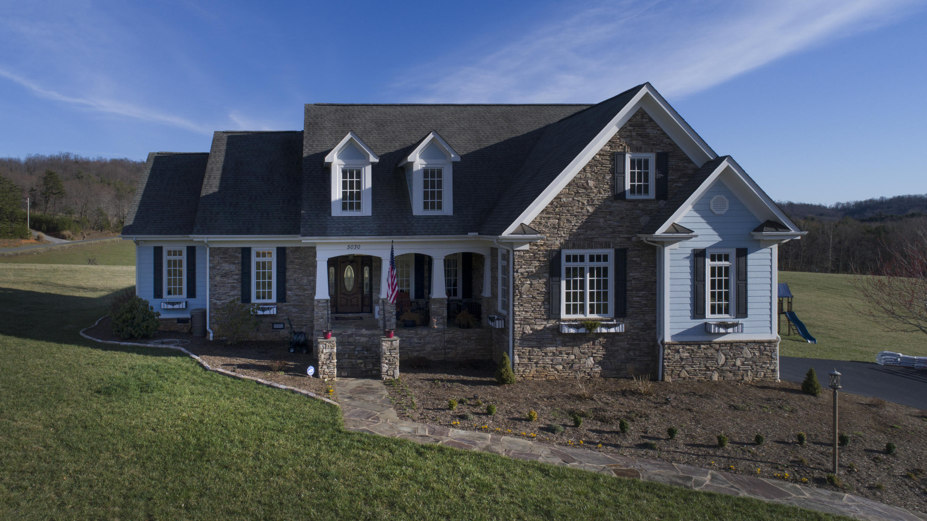 5030 Bethlehem Road Boones Mill, VA 24065 - Photo 38 of 43 a front view of a house with a yard