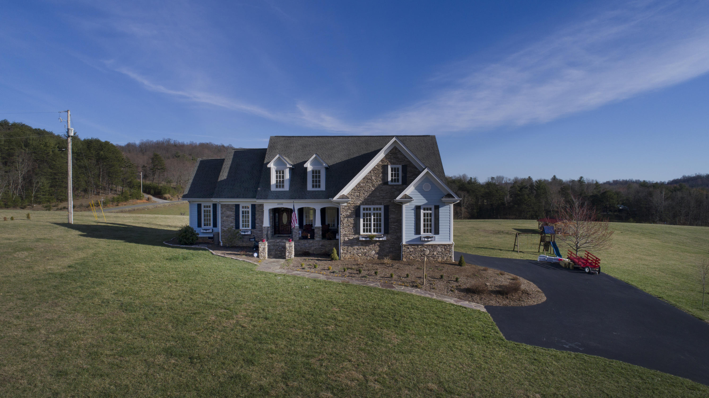 5030 Bethlehem Road Boones Mill, VA 24065 - Photo 40 of 43 a front view of a house with garden