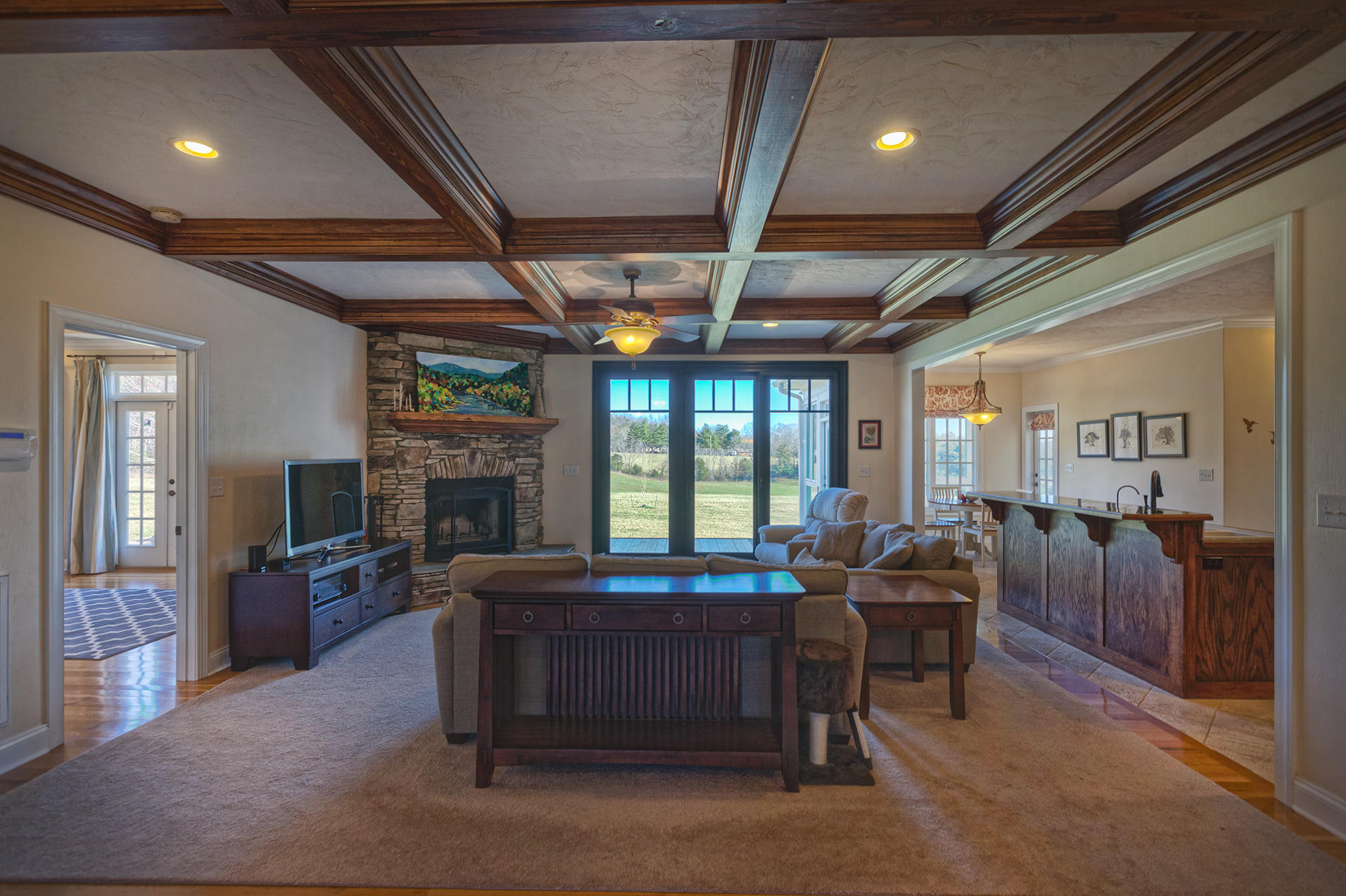 5030 Bethlehem Road Boones Mill, VA 24065 - Photo 5 of 43 a living room with furniture a flat screen tv and a fireplace