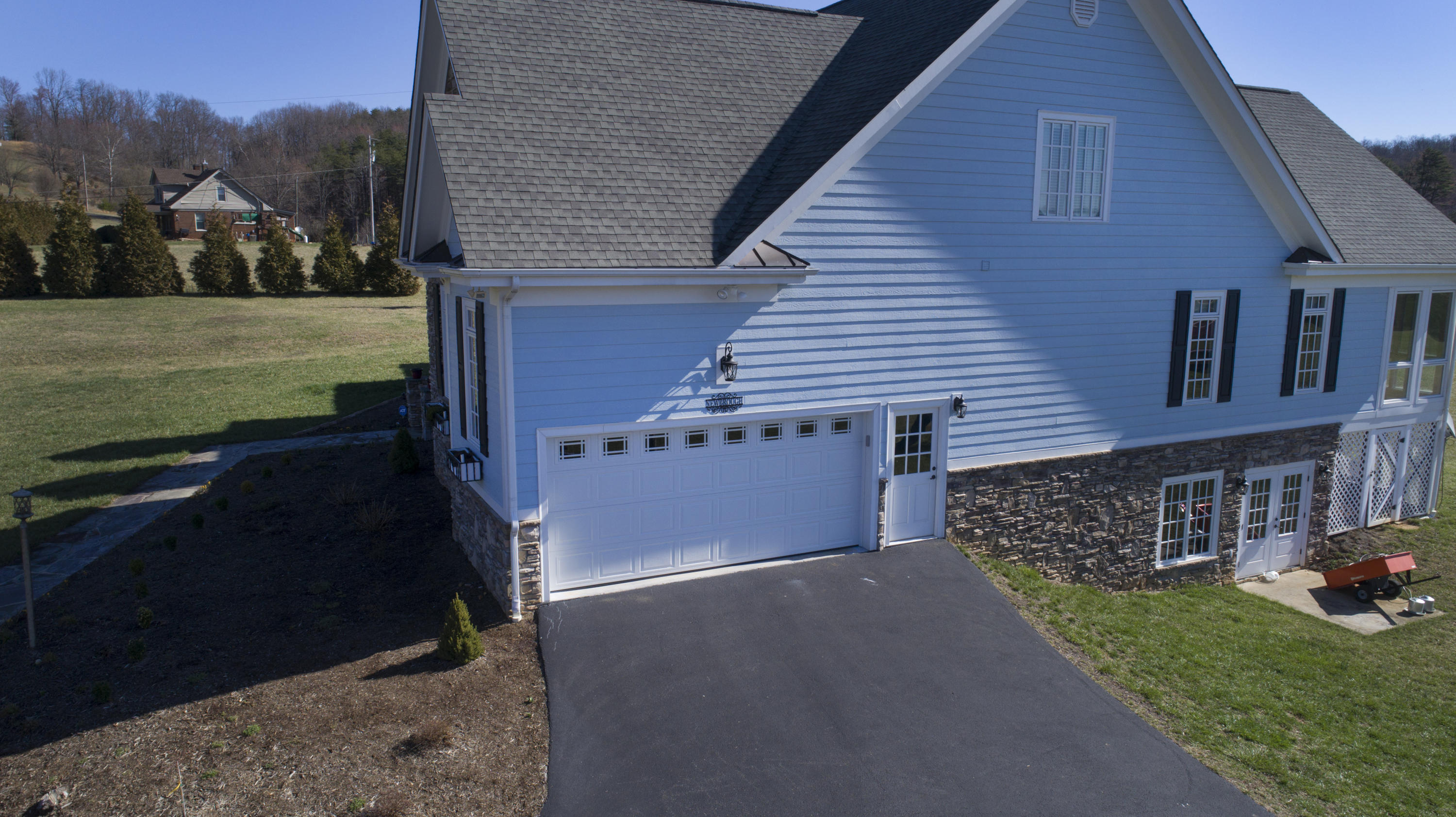 5030 Bethlehem Road Boones Mill, VA 24065 - Photo 41 of 43 a front view of a house with a yard