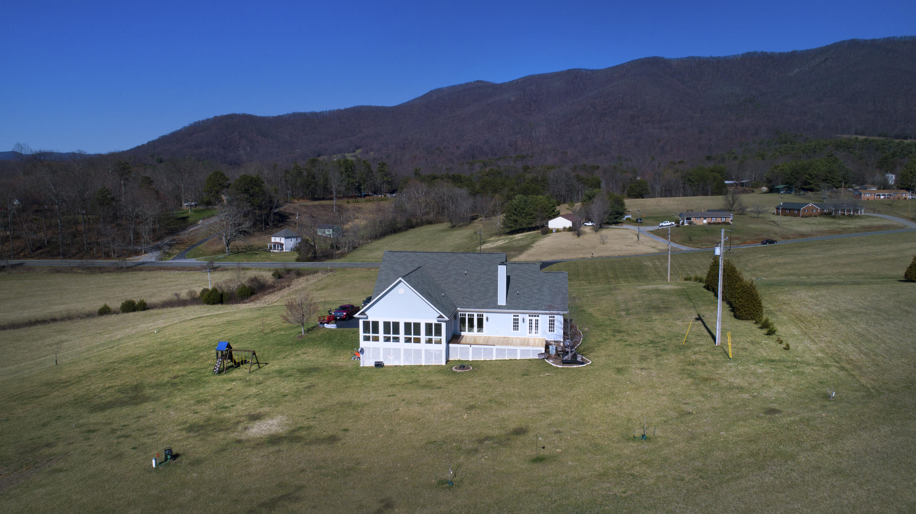5030 Bethlehem Road Boones Mill, VA 24065 - Photo 42 of 43 a view of multiple house with outdoor space and garden