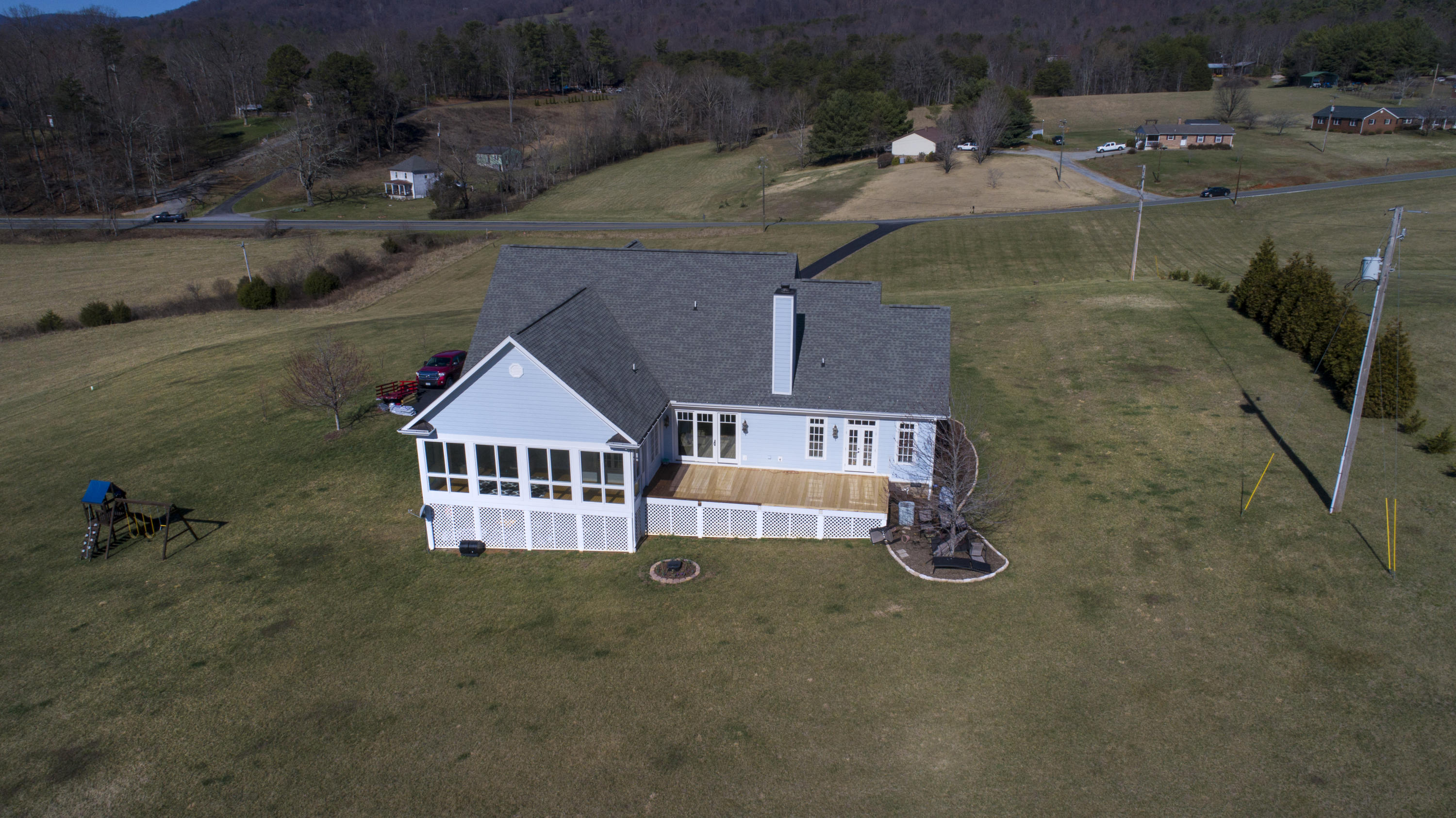 5030 Bethlehem Road Boones Mill, VA 24065 - Photo 43 of 43 an aerial view of a house with swimming pool and porch