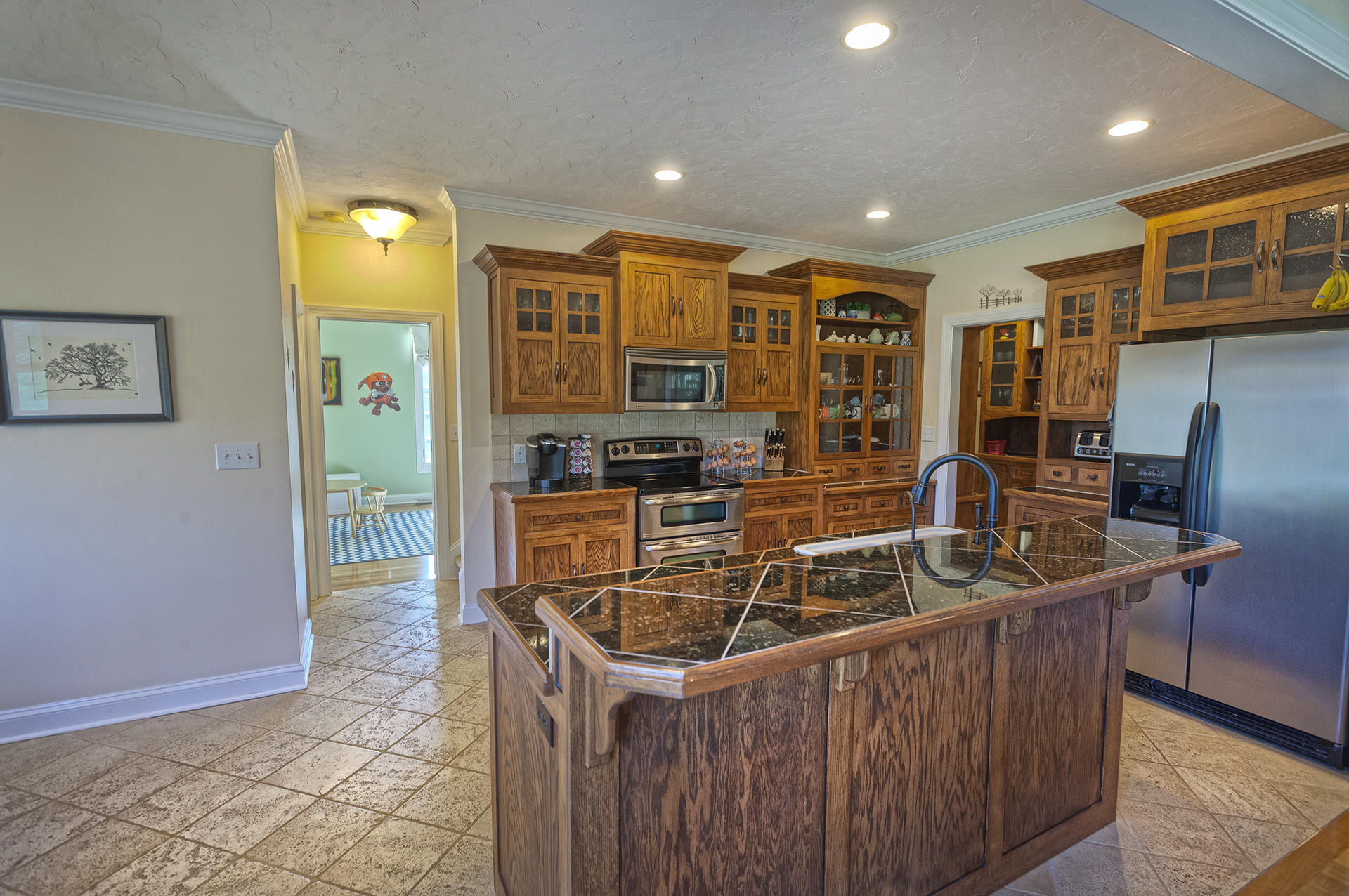5030 Bethlehem Road Boones Mill, VA 24065 - Photo 8 of 43 a kitchen that has a sink and a stove in it