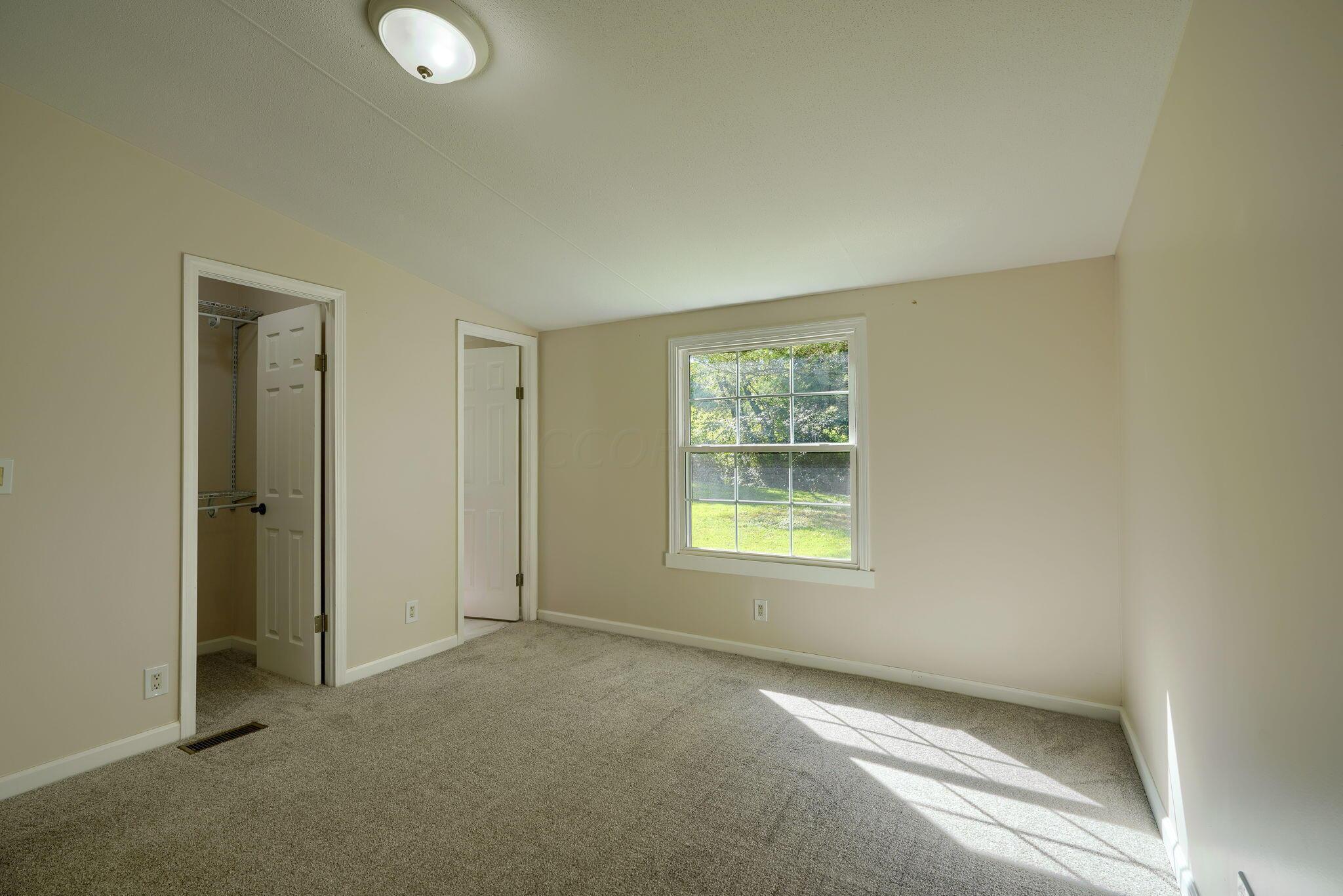 331 Massie Road Oak Hill, OH 45656 - Photo 16 of 29 16. Primary Bedroom
