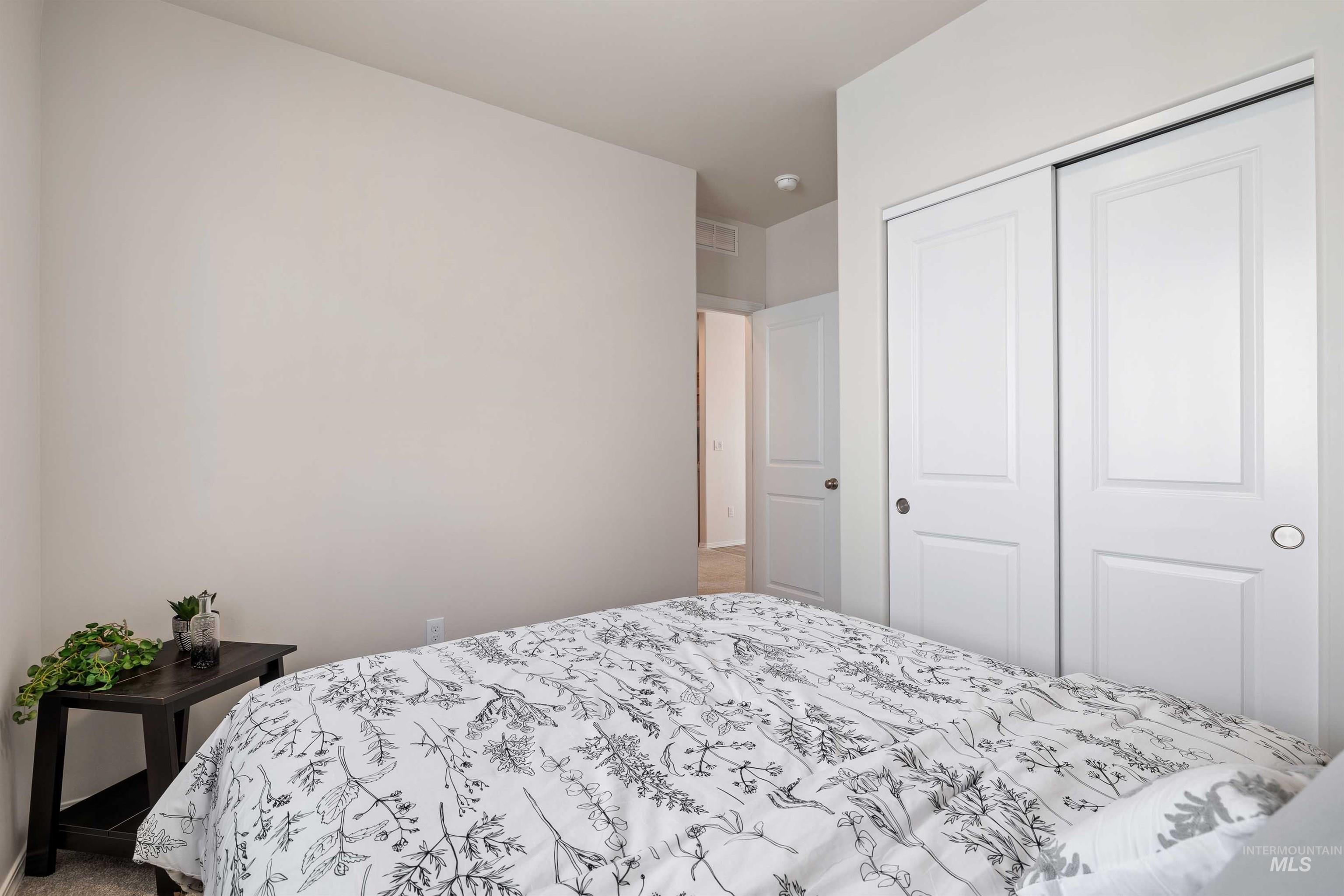 1603 Kenyon Mdw Street Twin Falls, ID 83301 - Photo 15 of 34 Bedroom featuring carpet and a closet