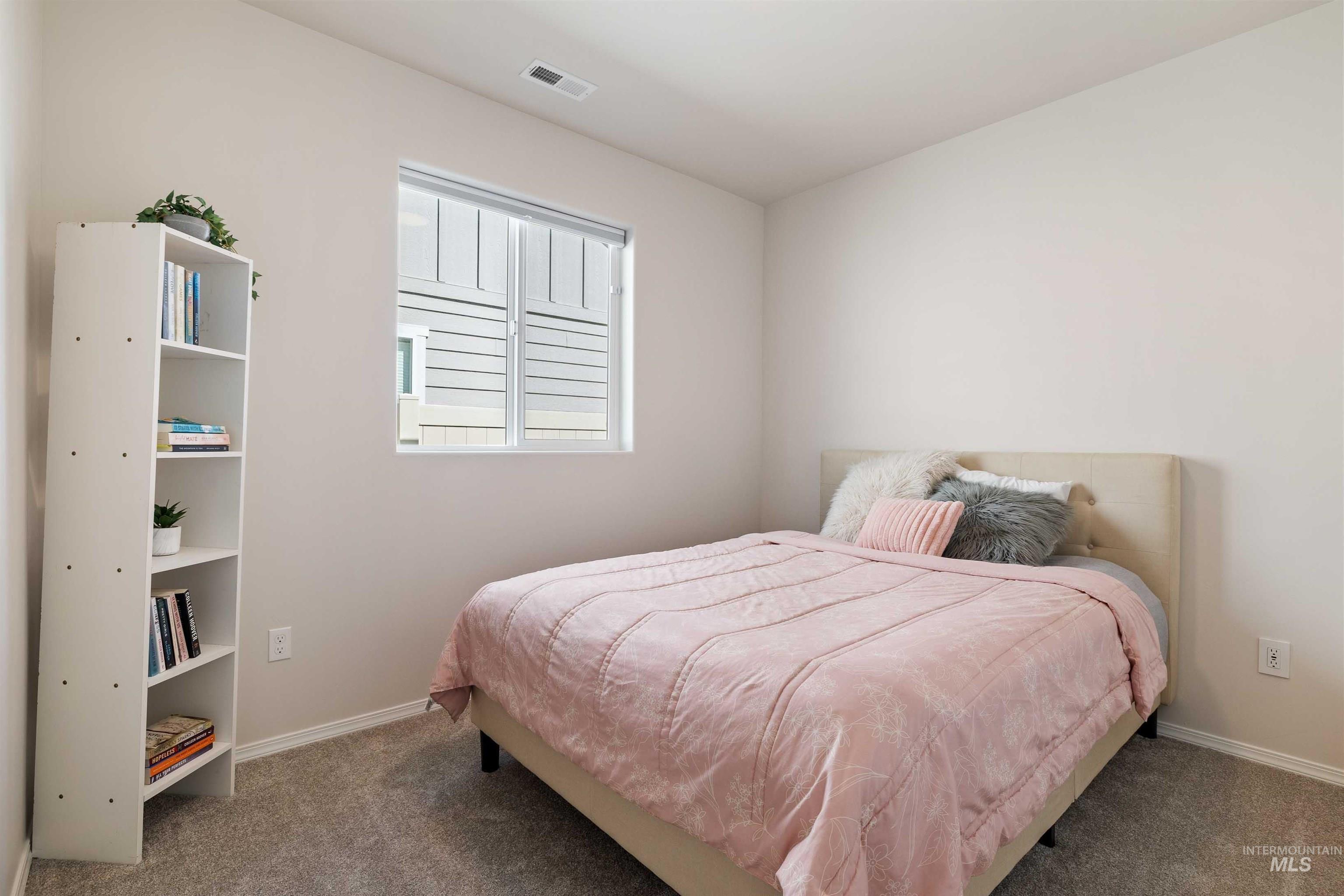 1603 Kenyon Mdw Street Twin Falls, ID 83301 - Photo 17 of 34 Bedroom with carpet and baseboards