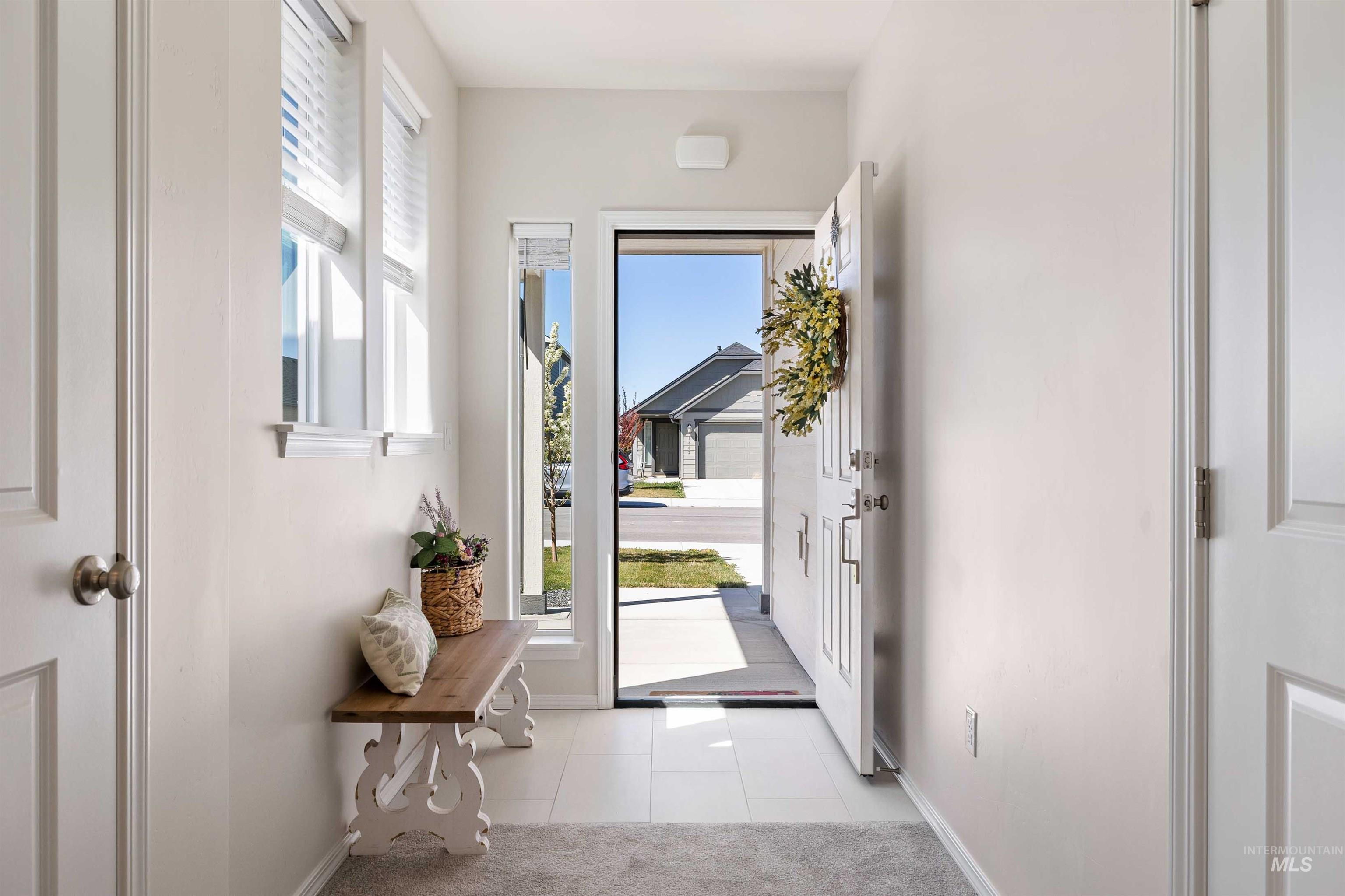 1603 Kenyon Mdw Street Twin Falls, ID 83301 - Photo 3 of 34 Entryway featuring tile patterned floors and baseboards