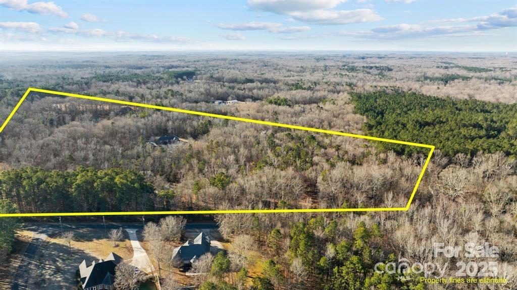 a view of a swimming pool with a lake view