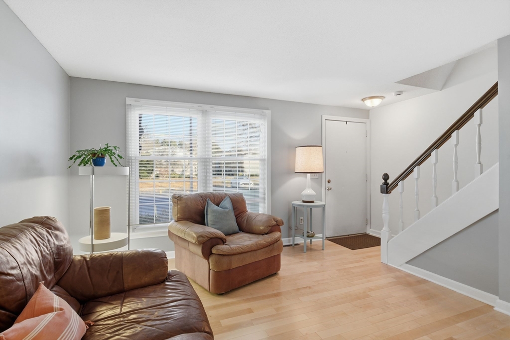 37 Corey Colonial, Unit 37 Agawam, MA 01001 - Photo 3 of 29 a living room with furniture and a large window