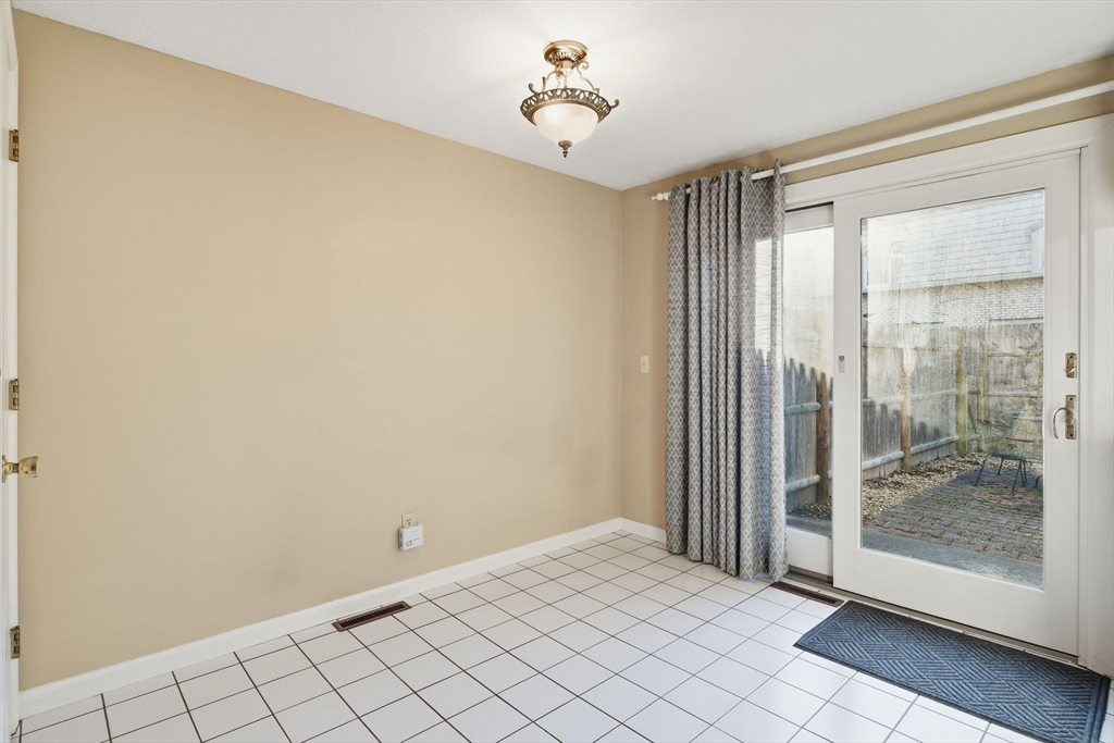 37 Corey Colonial, Unit 37 Agawam, MA 01001 - Photo 8 of 29 a view of a room with wooden floor and windows