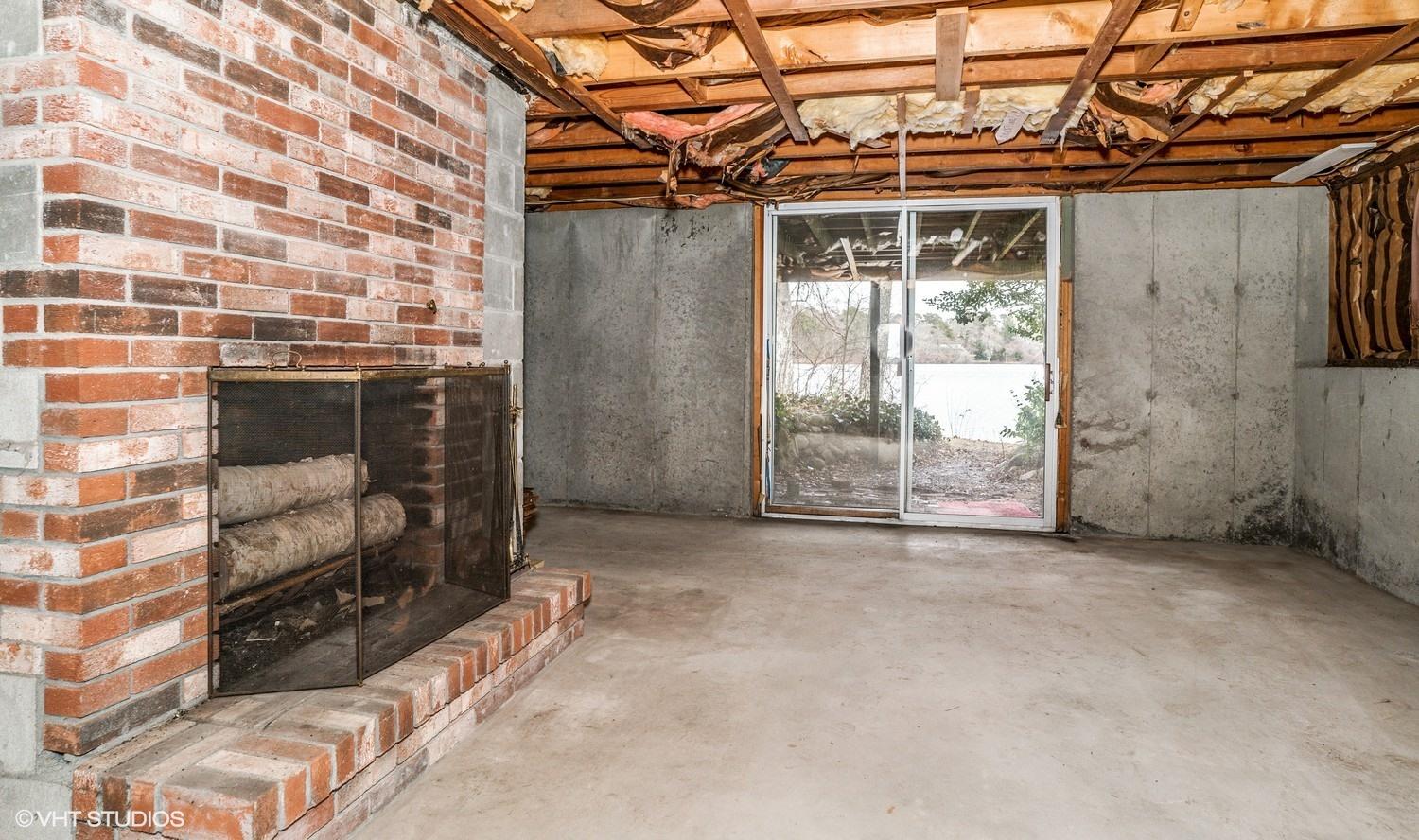 58 Nyes Point Way Centerville, MA 02632 - Photo 11 of 16 a view of a room with wooden walls