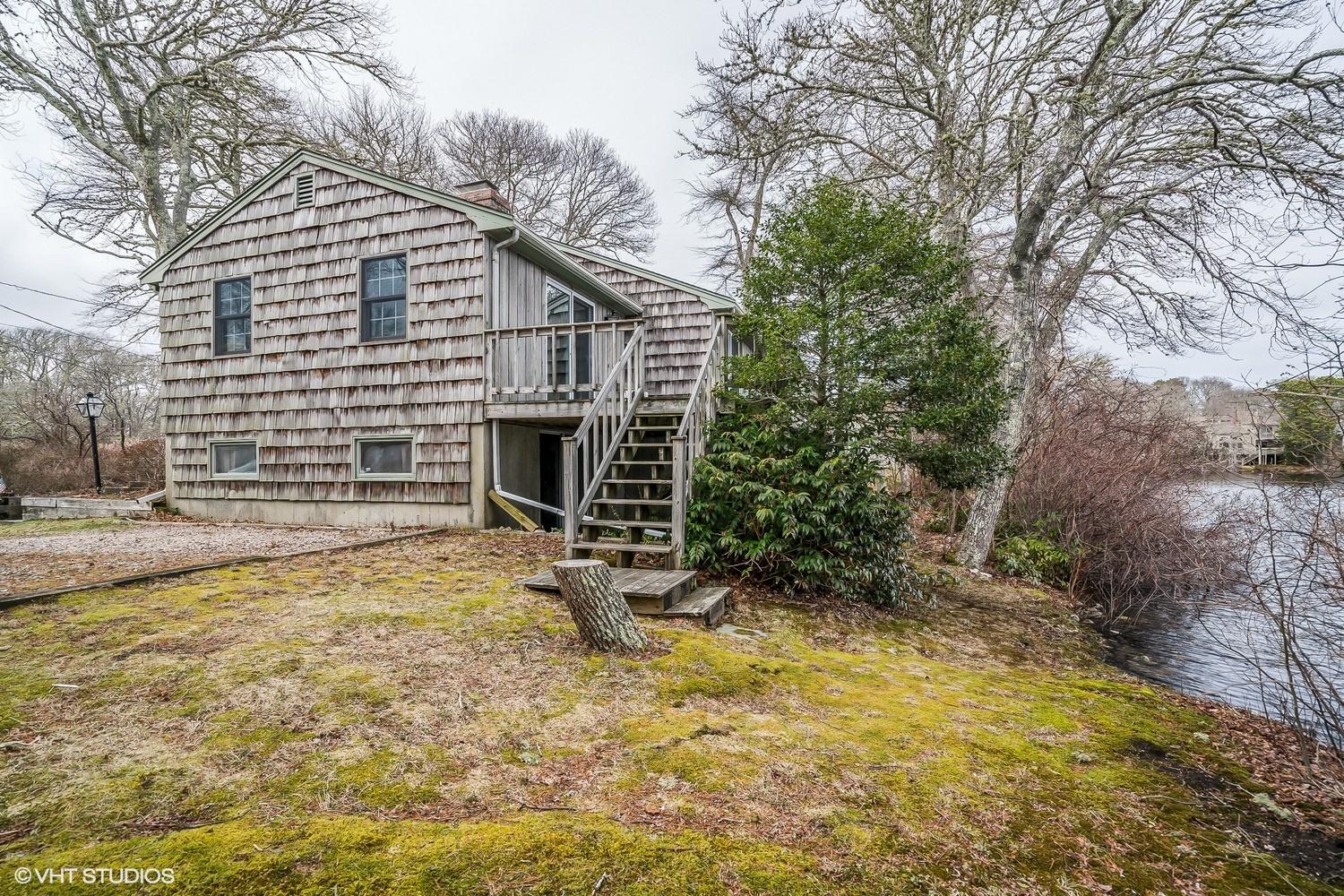 58 Nyes Point Way Centerville, MA 02632 - Photo 13 of 16 a view of a house with a yard
