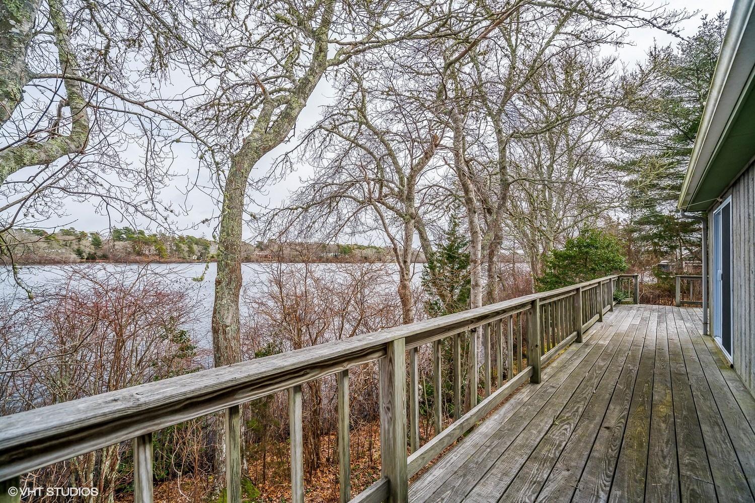 58 Nyes Point Way Centerville, MA 02632 - Photo 15 of 16 a view of balcony with wooden floor and fence
