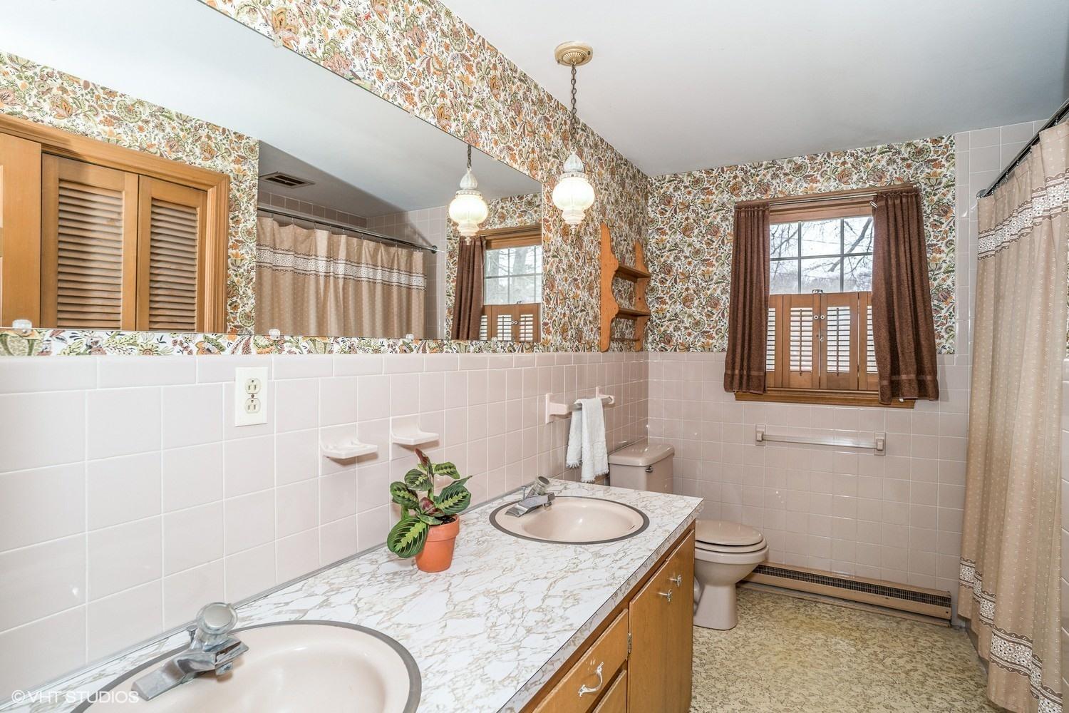 58 Nyes Point Way Centerville, MA 02632 - Photo 10 of 16 a bathroom with a granite countertop sink and a mirror