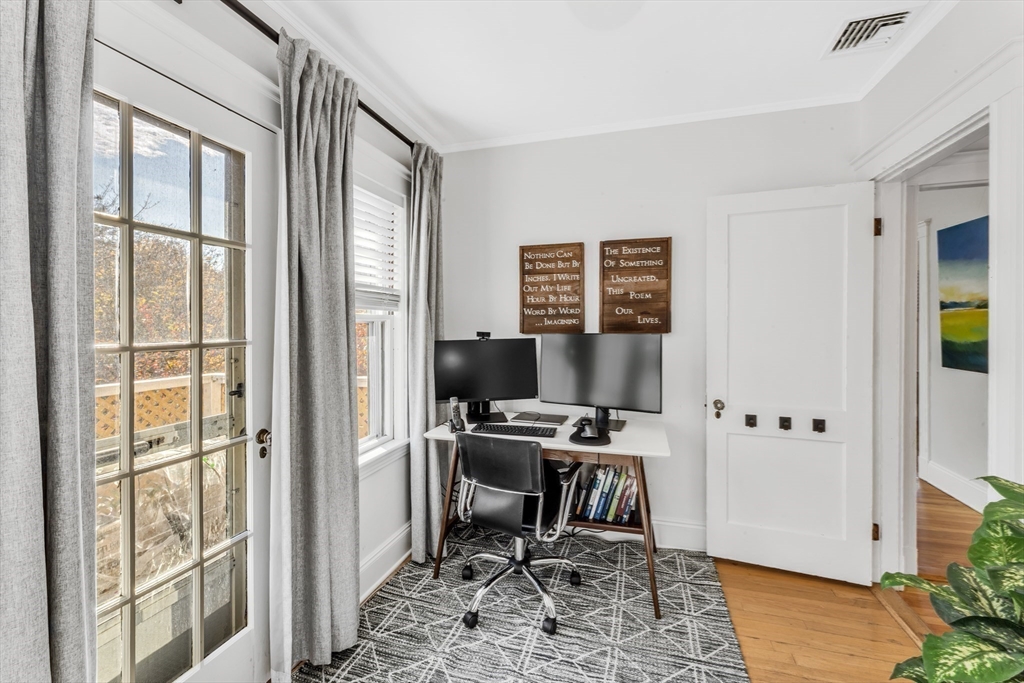 6 Arborough Road, Unit 2 Boston, MA 02131 - Photo 11 of 40 a view of a workspace with furniture and a window