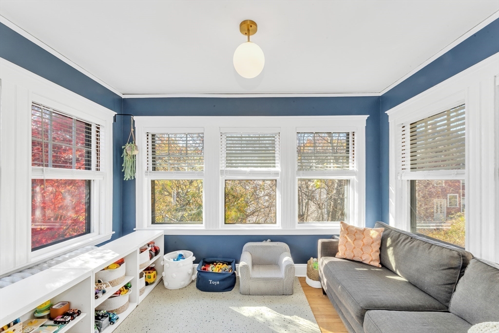 6 Arborough Road, Unit 2 Boston, MA 02131 - Photo 14 of 40 a living room with furniture and windows
